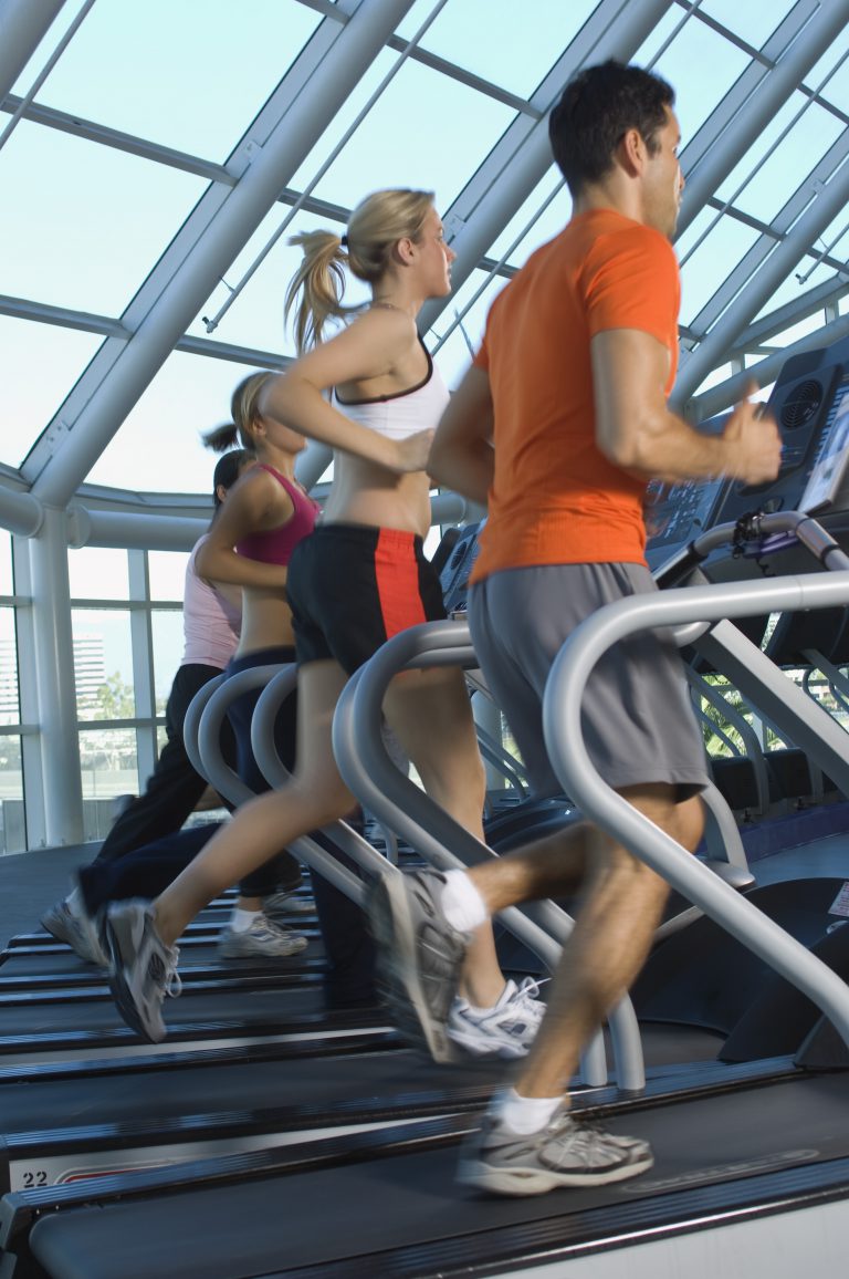 Joggers on Treadmills in Gym